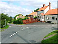 NZ4903 : Faceby, Village Centre with Road Junction, Cottages and .... er, a pub. by Mick Garratt