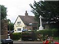 The Spotted Dog Pub and the War Memorial, Flamstead