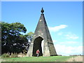 The Needle was built sometime between 1730-1745. Legend has it that the 2nd Marquis of Rockingham built it to win a bet that he could drive a galloping coach and horses through the eye of a needle. It sits on the prominent ridge running between...