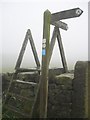 Fingerpost and stile at Hodsons Farm