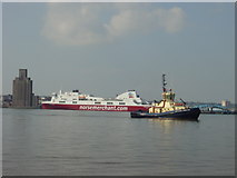 SJ3289 : Irish Ferry at Wallasey Dock and Mersey Tugboat by Sue Adair