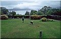 Garden of Duisdale Hotel, Duisdale, Isle of Skye, with Sound of Sleat in background