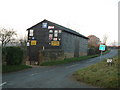 Barn with old signs, Buckland Common