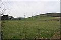 Pylons marching over fields near Broadland