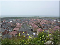 ST0665 : Housing in old quarry workings, Rhoose, South Wales by Jim Mitchell