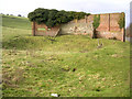 Wall of unknown purpose (rifle range butt?), below Poundbury hillfort