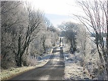 NT0160 : Icy road, West Harwood. by Richard Webb
