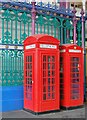 TQ3181 : Telephone boxes in Smithfield Market by Patrick Mackie
