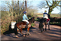 Silverton: riders by the entrance to Land Farm