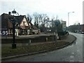 Village sign and pub, Drayton