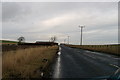 NO5645 : Looking north along the B961. by Gwen and James Anderson