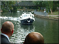 Boat on the River Lea arriving at the Priory with the bride for a wedding