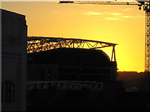 TQ3185 : Sun setting behind Stadium at Ashburton Grove by Julian Shulman
