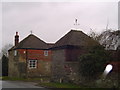 Twin weather vanes at Eastcott