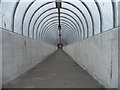 Covered footbridge over the M62.