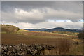 Pylons matching across farmland. North East of Auchlishie