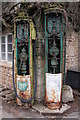 Old petrol pumps in winter, Withington