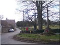 Brimpsfield Village Street and War Memorial