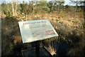 TF6628 : Notice on the board walk, Dersingham Bog by Dr W E Lee