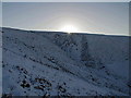 NT5662 : Winter sun above West Hopes by Alastair Seagroatt
