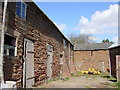 SJ5466 : Outbuildings, Tirley Farm by Sue Adair