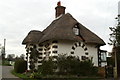 Thatched estate lodge, Frogham