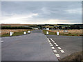 NY8896 : Approach to western entrance to Otterburn Camp by No Body