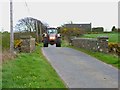 Tractor crossing the bridge over the Piltanton Burn