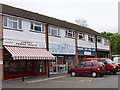 TQ0463 : Rowhill shops - butcher, baker, electrical appliance centre by David Hawgood
