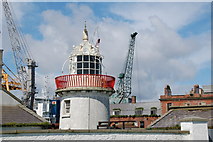 J2211 : Old lighthouse, Greenore harbour by Albert Bridge