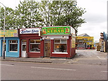 TQ2081 : Barber shop and kebab takeaway, Horn Lane, North Acton by David Hawgood