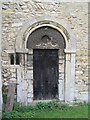 Door with tympanum. Church of St Medard and St Gildard, Little Bytham