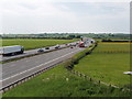 SP6702 : M40 motorway near Tetsworth by David Hawgood