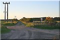 Looking towards Lossiemouth at  Wester Greens sign on the old railway track.