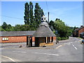 Telephone kiosk and bus stop, Hollowell