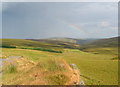 SJ0936 : Rainbow over Nant Rhydwilym valley by Espresso Addict