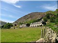 Cottages below Blaes Crag on Greenside Road