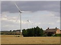 Houses and an Elegant Array of Wind Turbines