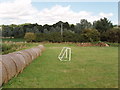 Straw bales surround a football pitch, Polstead