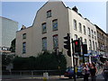 A building with interesting paintings on the side wall