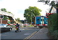 Train at level crossing by Nantwich station