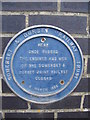 Plaque on railway gates