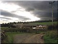 Coastley Farm under a threatening sky