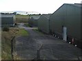 NS1900 : Mystery warehouses, Girvan Industrial Estate by Oliver Dixon
