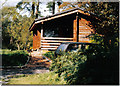 NX2463 : Log cabin, Torwood House Hotel by Ann Cook