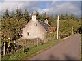 NH9451 : Roadside Cottage near Lethen by Ian R Maxwell