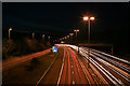 SU4017 : M27 westbound, Chilworth, by night by Peter Facey