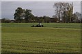 Mowing machinery in Poole Farm field