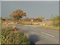 Junction of Thorpe Wood with Dam Lane.