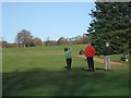 Golfers on Penn Common